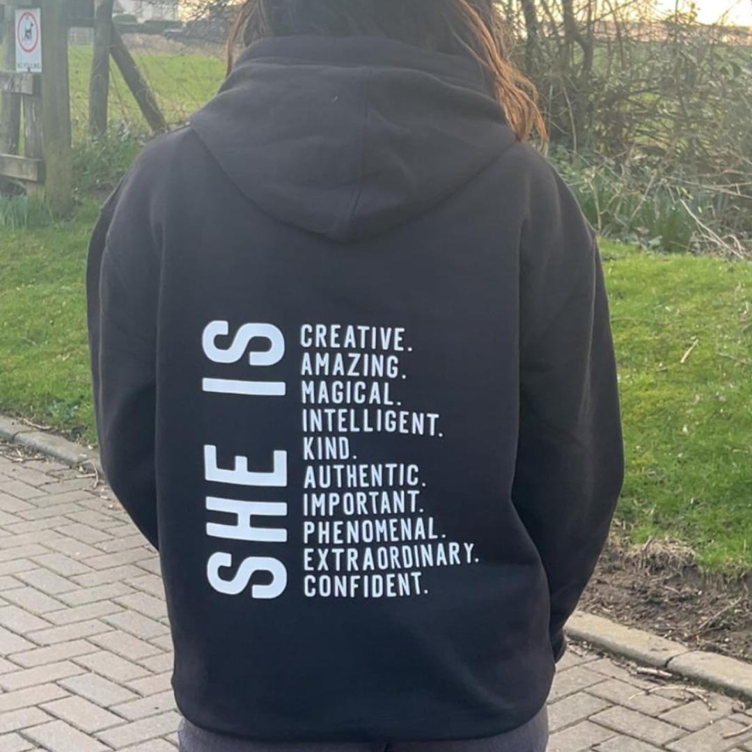 SHE IS - HOODIE
